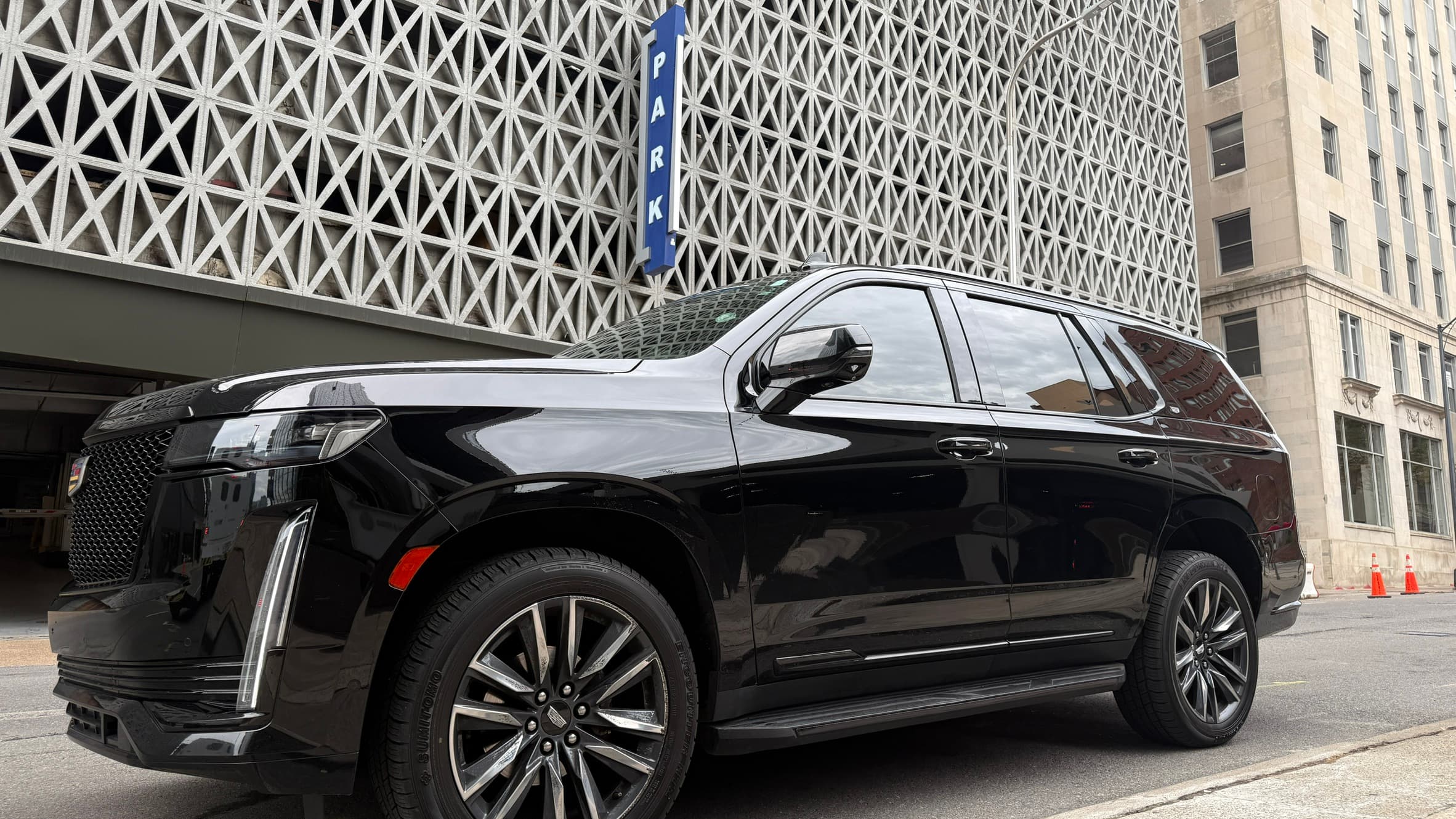 Moodily lit Cadillac Escalade side profile in Nashville